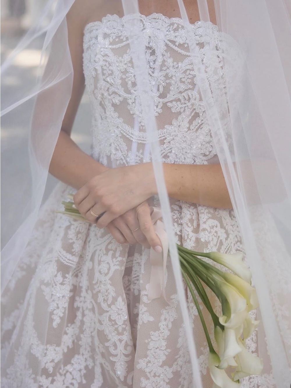 Nicole + Felicia Couture Strapless Lace Basque Ball Gown in Ivory